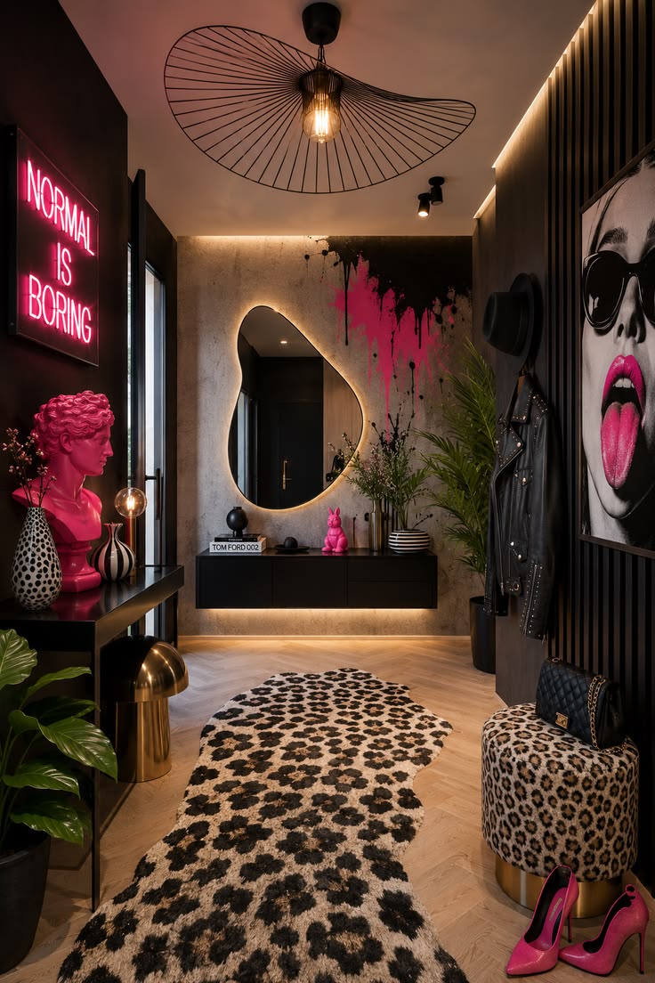 Bold entryway with an organic illuminated mirror, pink sculpture, graphic artwork and leopard-print runner